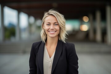 portrait of a beautiful young business woman smiling at the camera.