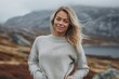 Medium shot portrait photography of a pleased woman in her 30s that is wearing a cozy sweater against a scenic mountain hike with breathtaking views background .  Generative AI