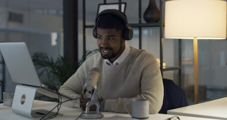 Poster - Microphone, podcast and a man with a laptop at night for live stream, radio broadcast or news. African male presenter and influencer in office with headphones for communication or journalist talk