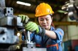 © Adriana - Asian woman technician in a factory is working on a metal drilling machine. Generative AI