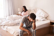 © Emil Lime/peopleimages.com - Bedroom, couple and sad man with problem, marriage conflict or stress over fail, depression or insomnia. Mental health risk, home bed and morning person depressed over mistake, anxiety or crisis