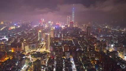 Wall Mural - Aerial hyperlapse of Taipei Downtown, the vibrant capital city of Taiwan, with landmark 101 Tower standing out amid high-rise buildings and city lights dazzling in Xinyi Commercial District at night