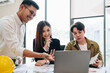 © Jirapong - multi ethnic engineer brainstorming and measuring for cost estimating on paperworks and floor plan drawings about design architectural and engineering for houses and buildings