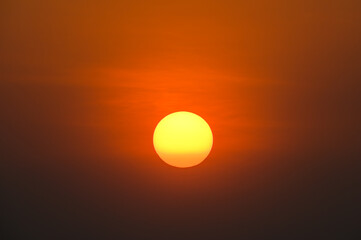 Sticker - big orange sun on sunset background