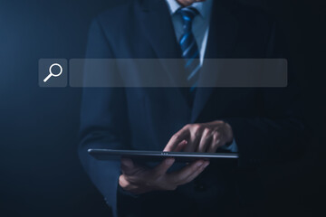Wall Mural - businessman showing internet search in laptop