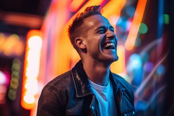 lifestyle portrait photography of a glad boy in his 30s laughing against a neon sign background. wit