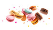 Colorful macaroons flying isolated on transparent background. French dessert. PNG format