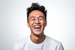 © Markus Schröder - Headshot portrait photography of a happy boy in his 30s laughing against a white background. With generative AI technology