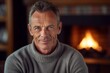 © Markus Schröder - Close-up portrait photography of a glad mature boy wearing an elegant long-sleeve shirt against a cozy fireplace background. With generative AI technology