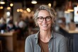 © Markus Schröder - Headshot portrait photography of a satisfied mature girl wearing a comfortable pair of jeggings against a cozy coffee shop background. With generative AI technology