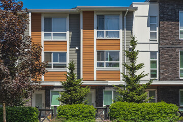 Wall Mural - New Modern Apartment Buildings in Vancouver BC. Canadian modern residential architecture on sunny summer day