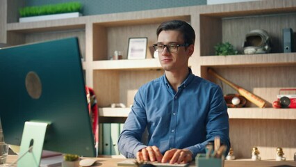Wall Mural - Smiling creator working computer office closeup. Inspired man checking notebook