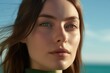 Close-up portrait photography of a tender girl in her 20s covering one's eyes against a sea-green background. With generative AI technology