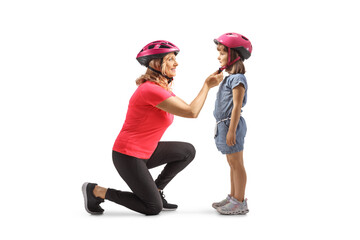 Poster - Mother putting a helmet on a child