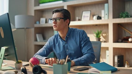 Wall Mural - focused creator typing computer keyboard at office interior closeup. man working