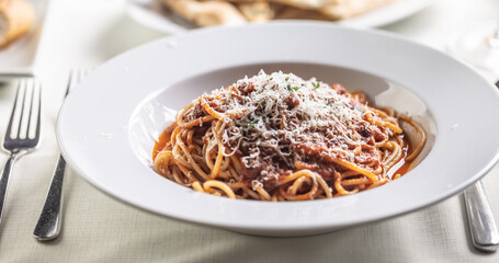 Canvas Print - Spagheti pomodoro e basilico with freshly grated parmesan cheese on top