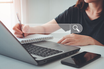 SEO, Search Engine Optimization. Woman working on laptop computer keyboard searching the information, internet browsing. Web page banner, data search technology.