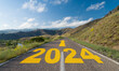 New year goals. The numbers for 2024 were written on the rural road. Beginning of the new year 2024