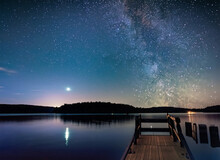 Stars Over Lake In Maine With Dock. Nature View. Generative AI