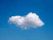 © Studio-M - Single white cloud over blue sky background. Fluffy cloud shape photo