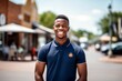 Medium shot portrait photography of a happy mature boy wearing a sporty polo shirt against a small town main street background. With generative AI technology