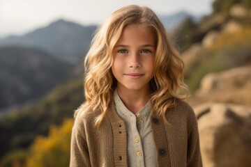 Canvas Print - Headshot portrait photography of a glad kid female wearing a chic cardigan against a scenic canyon background. With generative AI technology