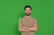 © New Africa - Chroma key compositing. Handsome man smiling against green screen