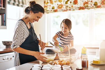 Canvas Print - Mother, cooking or happy girl baking in kitchen as a family with a young kid learning cookies recipe at home. Cake pastry, baker or mother helping or teaching daughter to bake for child development