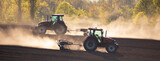 Fototapeta  - Cultivating with a tractor: getting the job done right