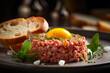 Beef tartar with lemon and herbs, greenery and spices, served on restaurant table. French cuisine, classic beef steak tartare, ingredients: raw beef meat, salt, pepper, egg, garlic. AI generated