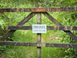 © nigel - private land gate sign in the countryside