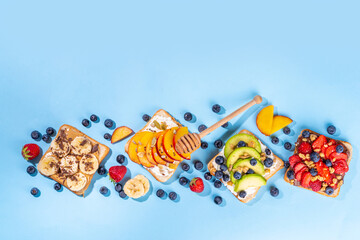 Sticker - Fruit berry sandwiches. Various toasts with peanut butter, cream cheese, chocolate spread with summer berries and fruits - strawberry, banana, peach, apple, blueberry, Tasty morning lunch food