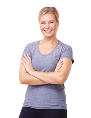 Happy woman, portrait and arms crossed for exercise, confidence and isolated on a transparent PNG background. Female person, smile and model in sportswear for healthy fitness, workout and proud