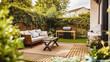 © Gasspoll - A Cozy Backyard Retreat with a Wooden Table, Soft Sofa, and Grill, Nestled Amidst a Lush Green Garden, Generative AI