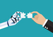 Businessman and AI robot hand connect jigsaw puzzle together