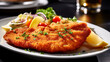 Vienna schnitzel with a side dish at a restaurant, traditional Austrian cuisine
