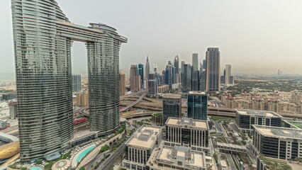 Wall Mural - Pnorama showing futuristic Dubai Downtown and finansial district skyline aerial timelapse.