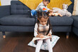 © Krakenimages.com - Adorable boy and girl playing with hoops game drawing on notebook at home