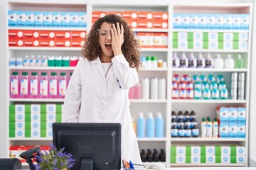 Sticker - Hispanic woman with curly hair working at pharmacy drugstore yawning tired covering half face, eye and mouth with hand. face hurts in pain.