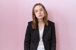 © Krakenimages.com - Young caucasian business woman wearing black jacket looking sleepy and tired, exhausted for fatigue and hangover, lazy eyes in the morning.