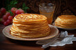 stack of pancakes on the table with honey and grapes close-up