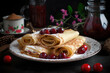 pancakes with cottage cheese and cherries sprinkled with powdered sugar on the table, close-up
