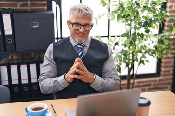 Poster - Middle age grey-haired man business worker having video call at office