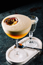 Glass Of Porn Star Martini Cocktail On Dark Background