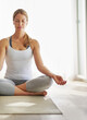 © Cecilie Arcurs/peopleimages.com - Calm woman, yoga and meditation on mat for spiritual wellness, zen or healthy workout on floor at home. Relaxed female person or yogi meditating for mindful exercise or awareness with mockup space