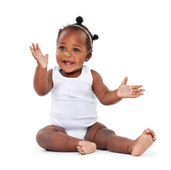 Baby, girl and smile with infant, excited and cheerful isolated against a white studio background. Female child, kid on the floor and adorable toddler with joy, relax and growth with newborn and care