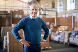 Fototapeta  - Happy, delivery and portrait of man in warehouse for cargo, storage and shipping. Distribution, ecommerce and logistics with employee in factory plant for supply chain, package or wholesale supplier