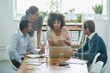 © Tabitha Rose/peopleimages.com - Discussion, laptop and business people in the office planning a project together in boardroom. Meeting, teamwork and professional web designers working in collaboration with a computer in workplace.