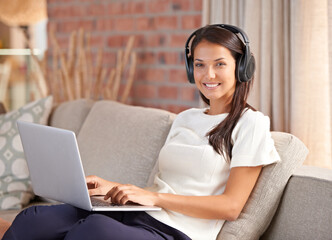 Poster - Headphones, laptop and portrait of a woman student on home sofa listening to music or streaming online. Happy female person smile, relax and learn new language with internet connection and tech