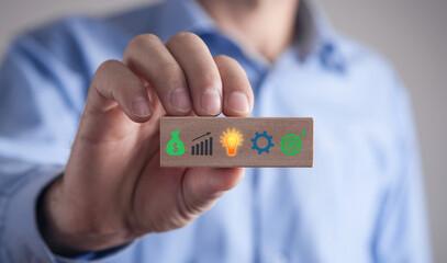 Sticker - Business symbols on wooden block. Business process. Goal. Achievement